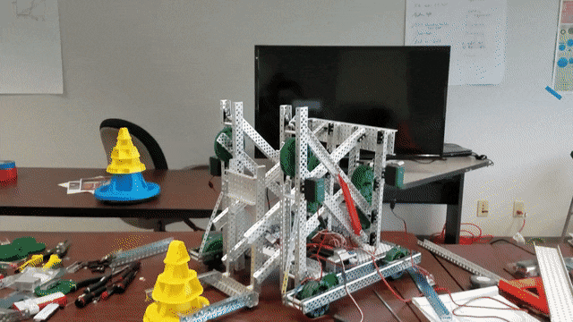 A gif showing a double reverse 4 bar lift